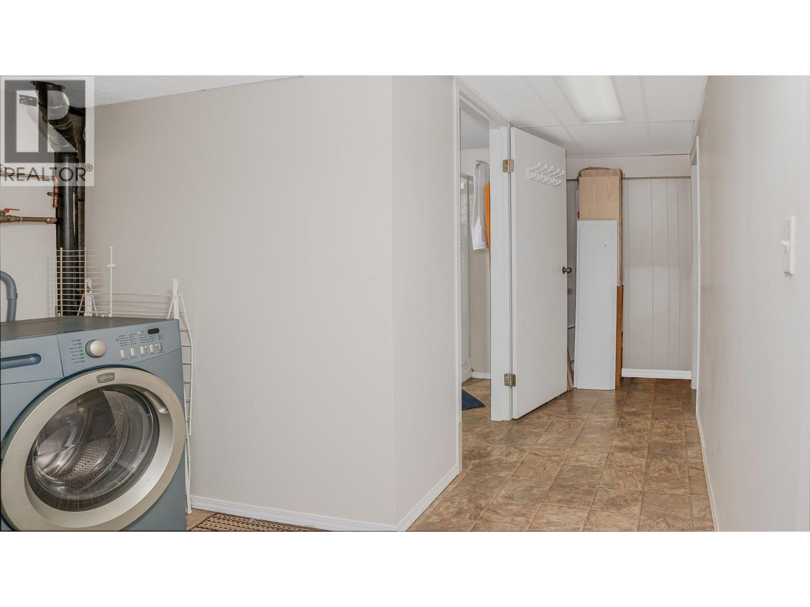 Downstairs hallway to laundry