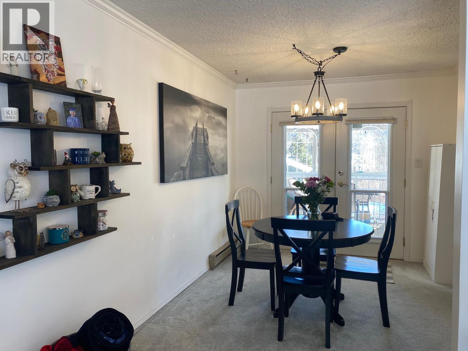 Convenient patio doors off dining room