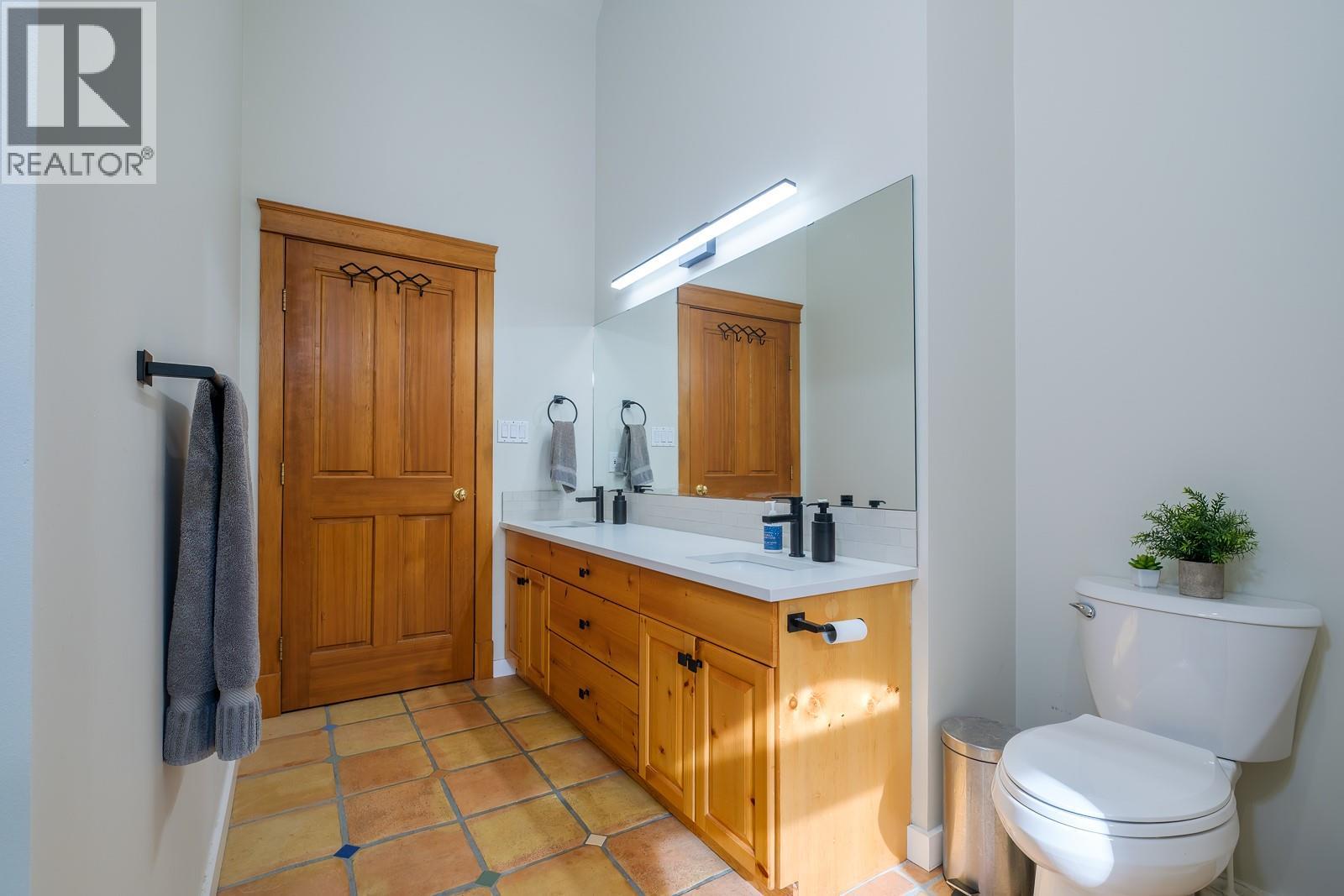 Updated kids bathroom: sinks, counter, fixtures, shower.