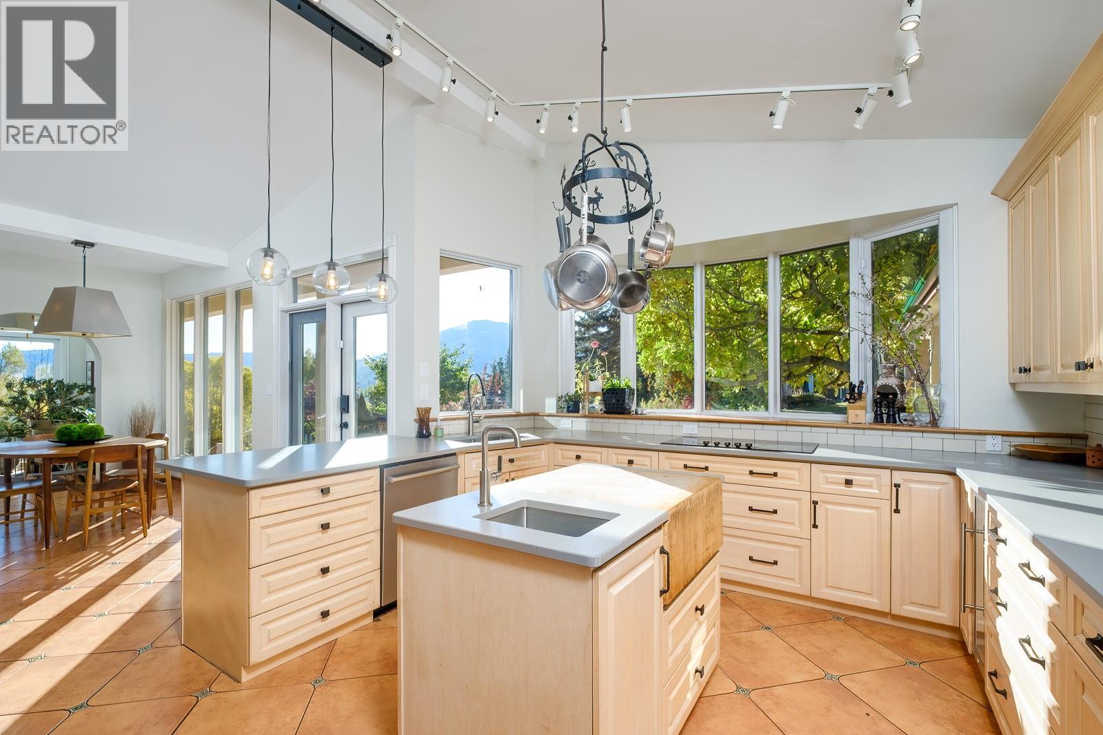 Recent kitchen updates: new countertops, fixtures,  coffee bar, drawers and soft close pulls.