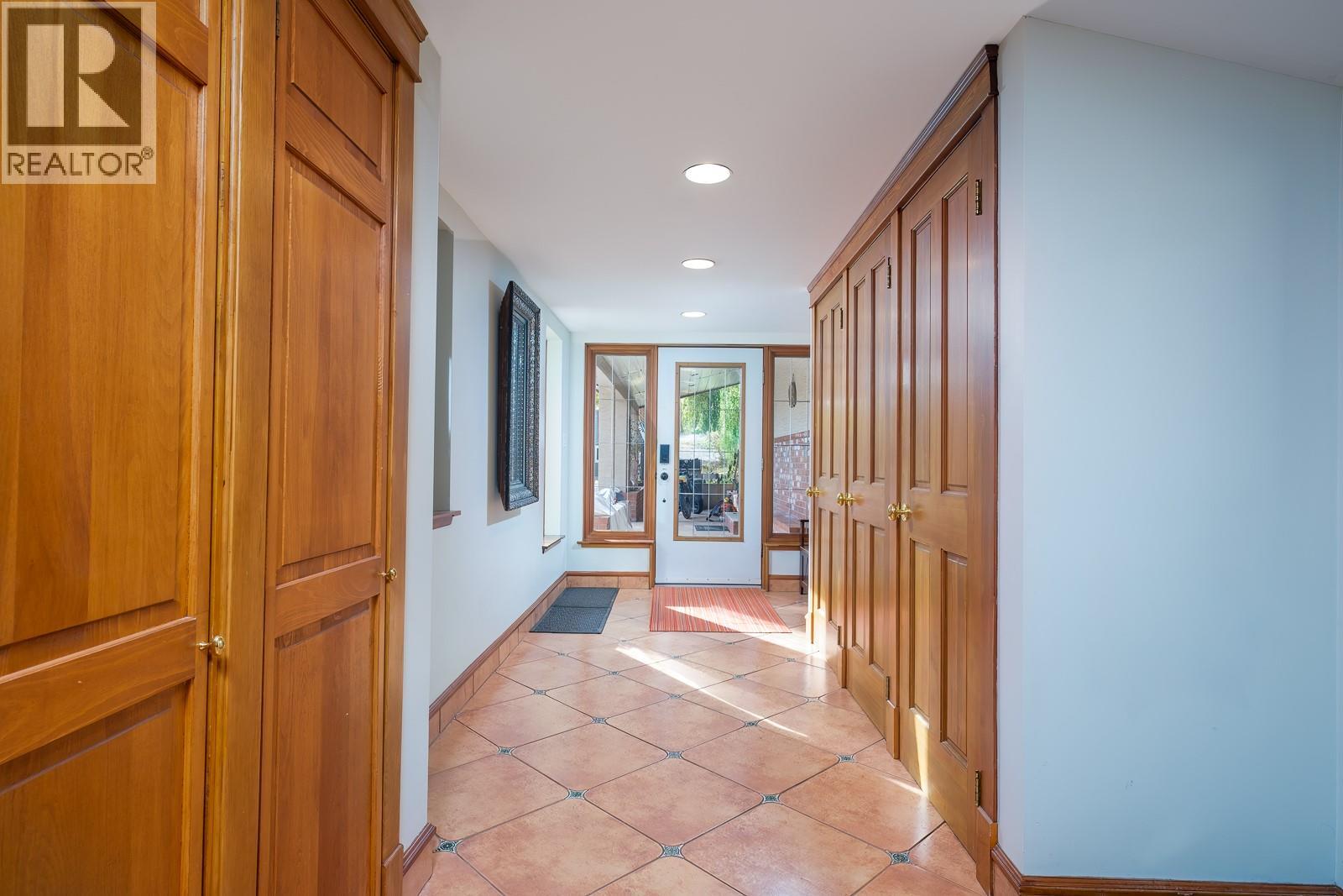 Entry: from breezeway & 3 vehicle carport / garage.