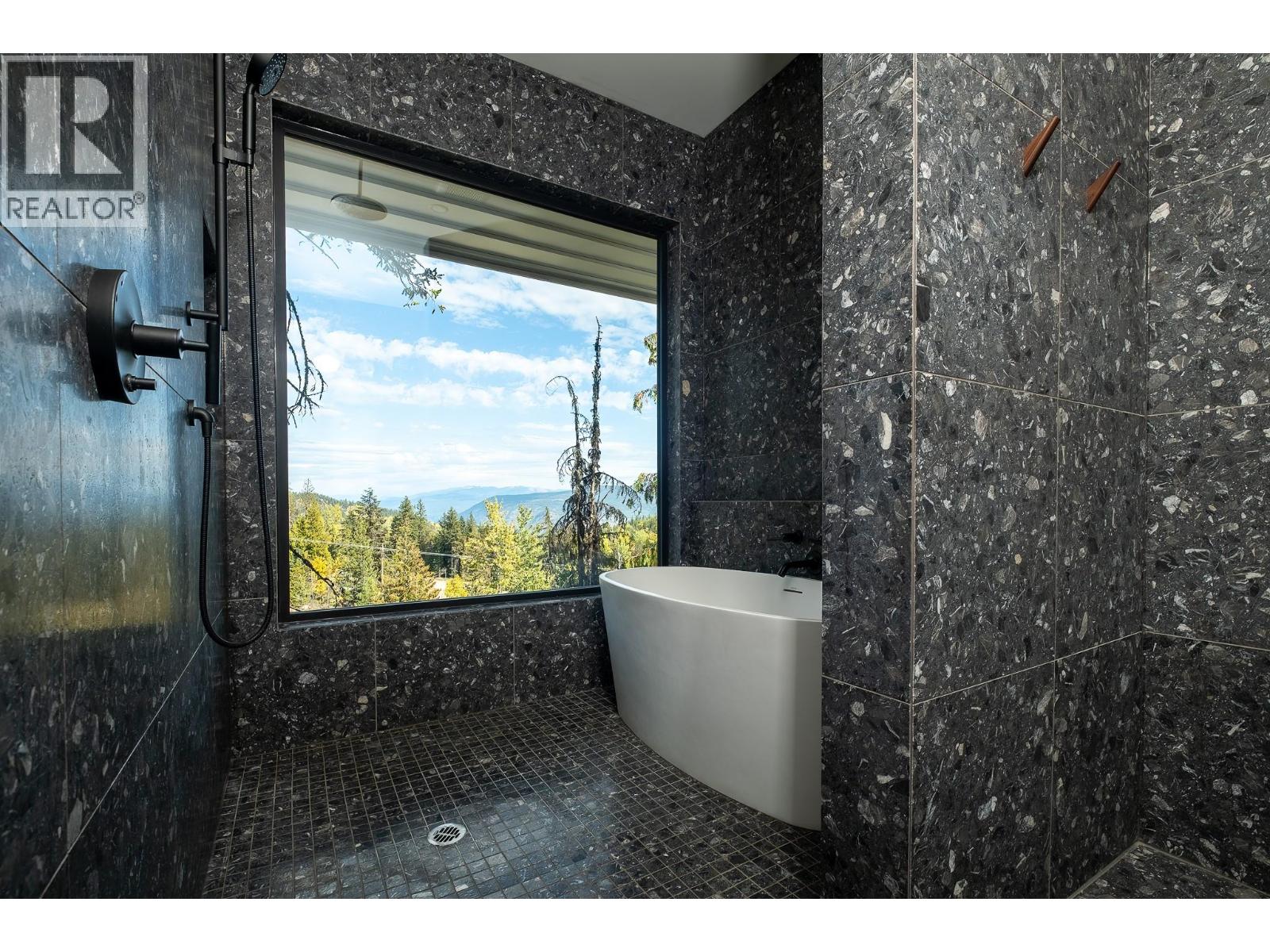 Tiling in the ensuite bathroom is $$$, luxury experience.