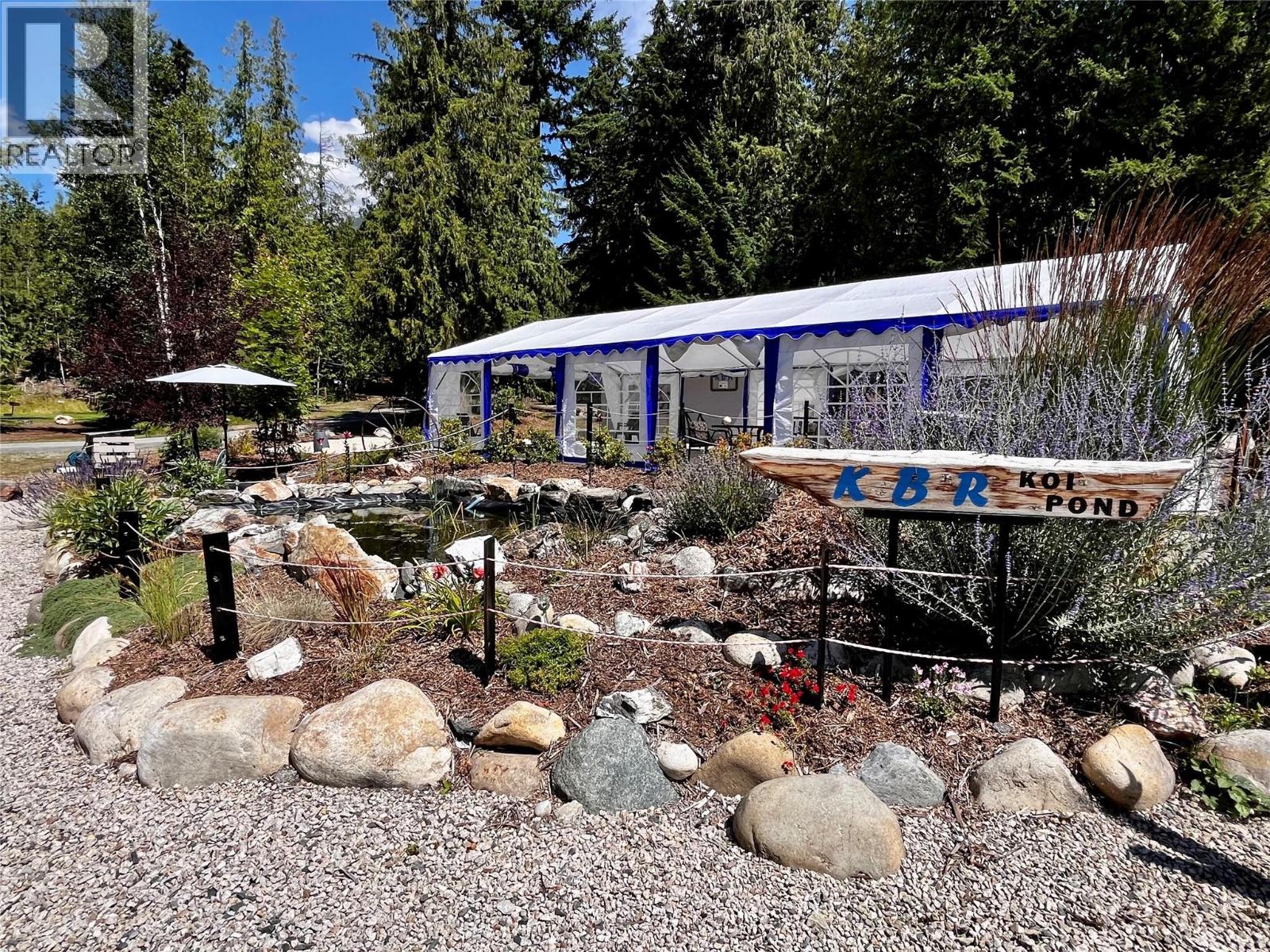 Landscaping with guest games area in back