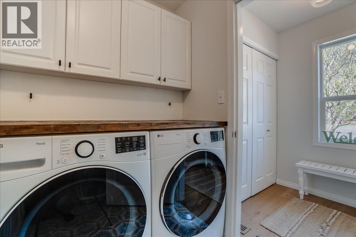 Laundry room main level by foyer