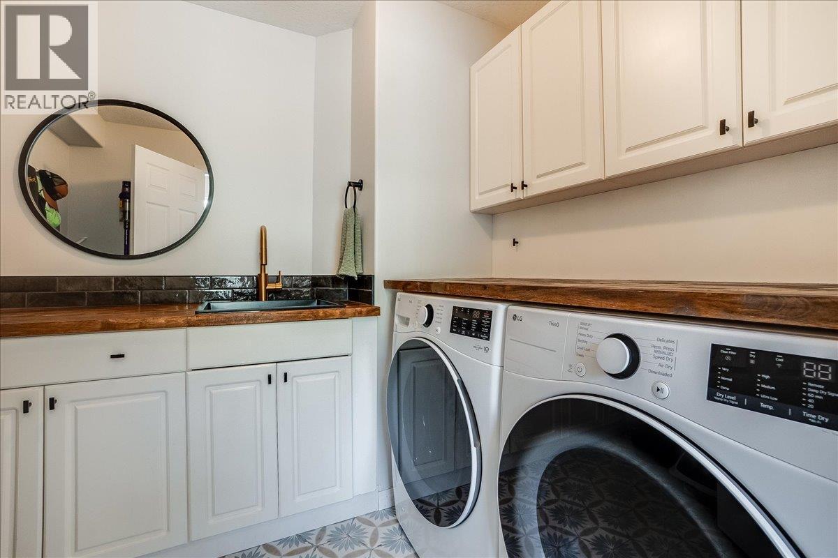 Laundry room main level by foyer