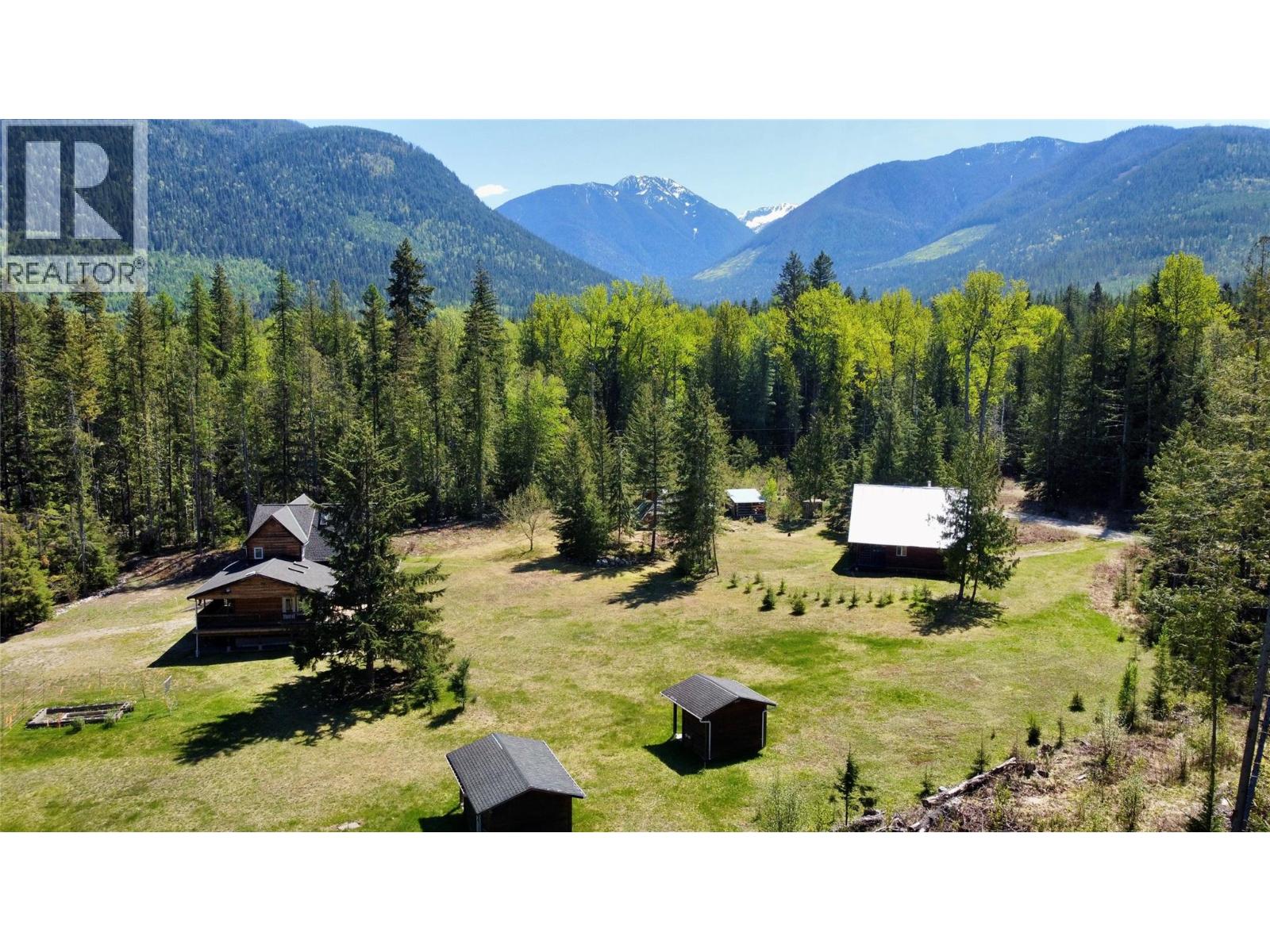 Main part of property with house, detached cottage and detached cabin
