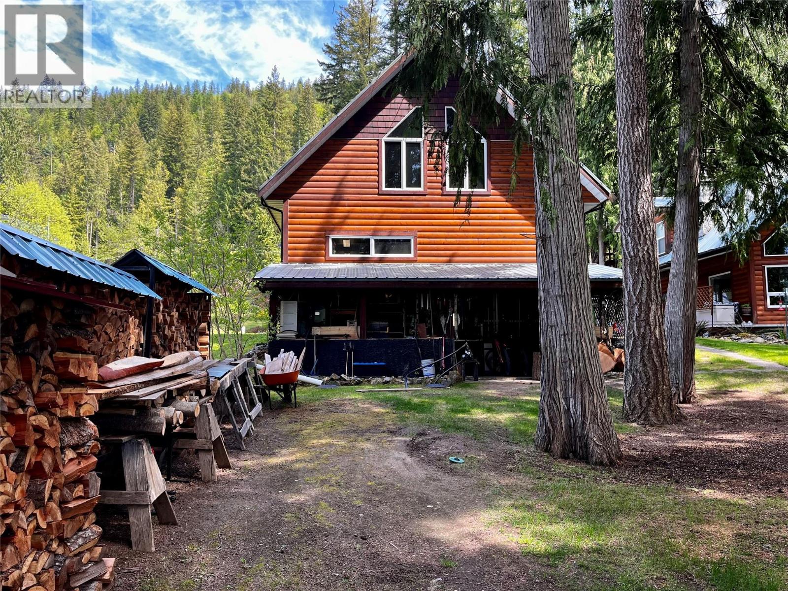 Firewood storage and space for kayaks/canoes (not pictured)