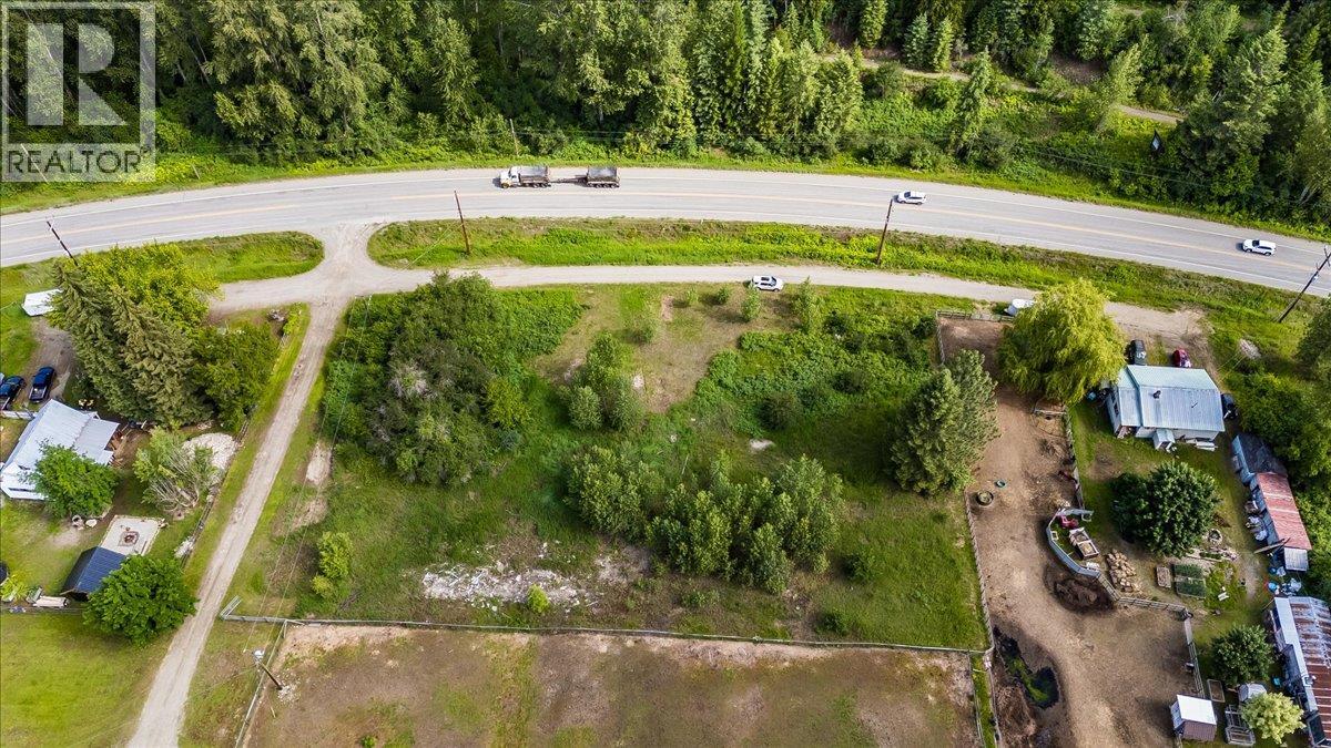 Rectangular 1.1 acre parcel with highway frontage and Gibbons Road access