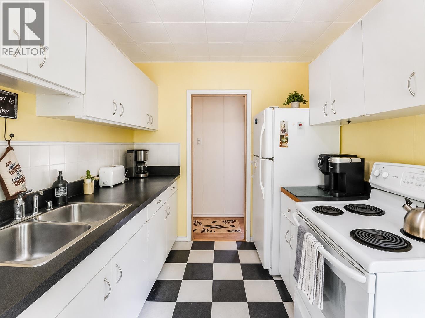 This image has been virtually enhanced by de-cluttering and light staging