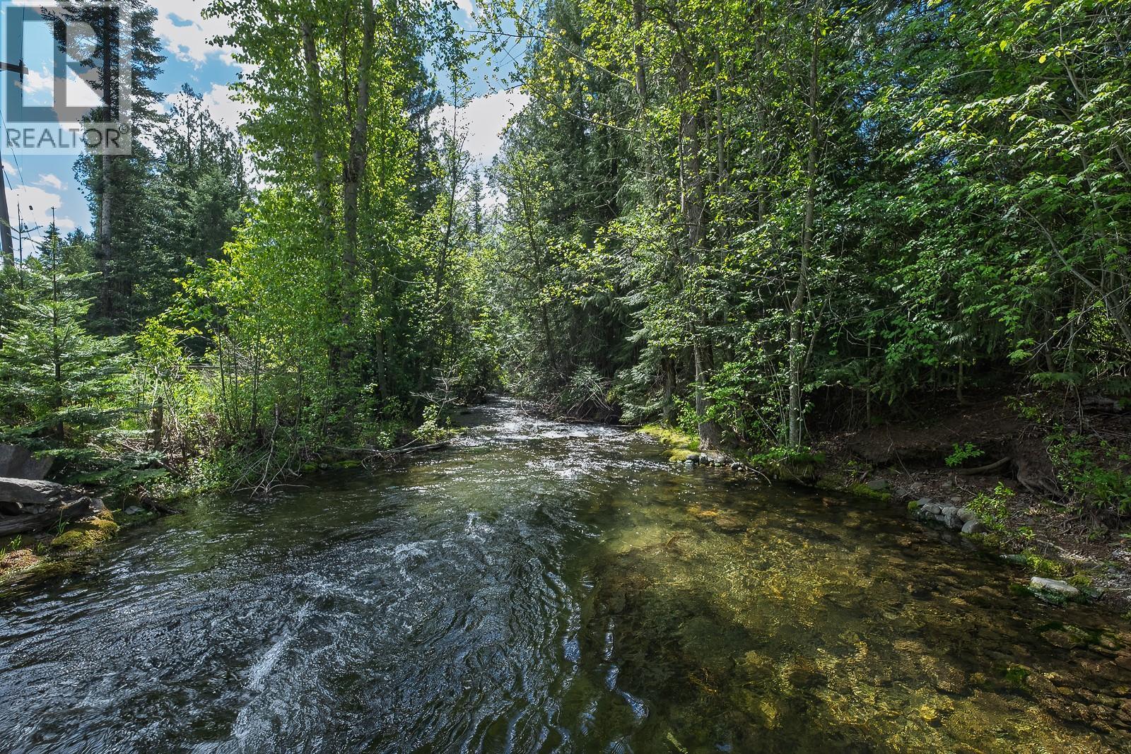 Cooling off and fishing in Little Sheep Creek.