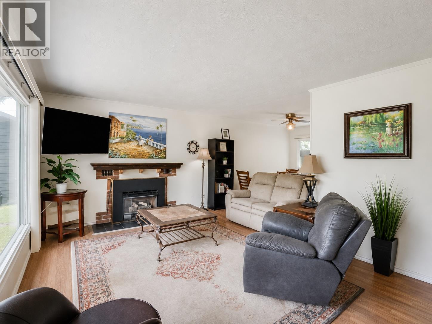 This image has been virtually enhanced by de-cluttering and light staging