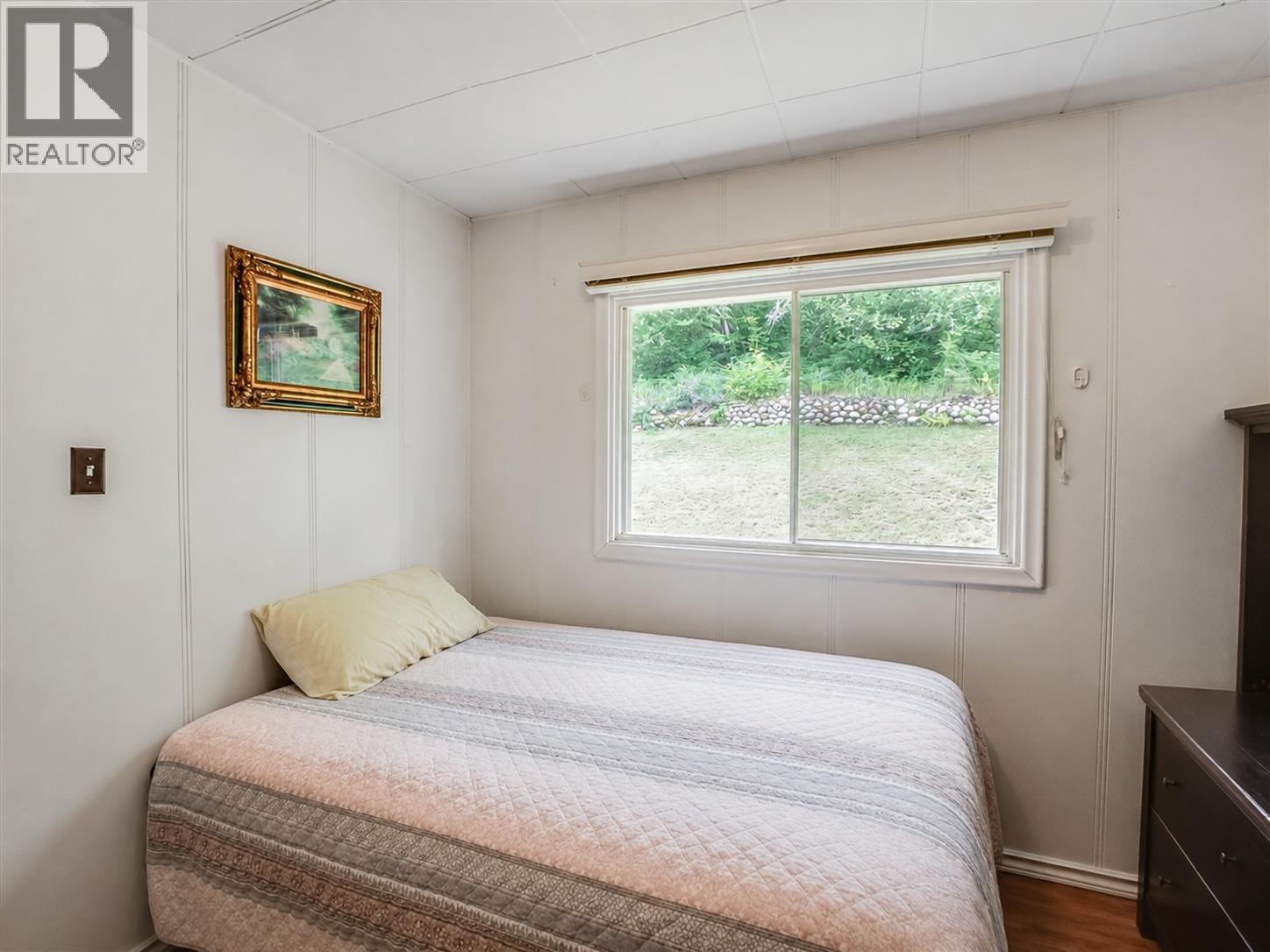This image has been virtually enhanced by de-cluttering and light staging