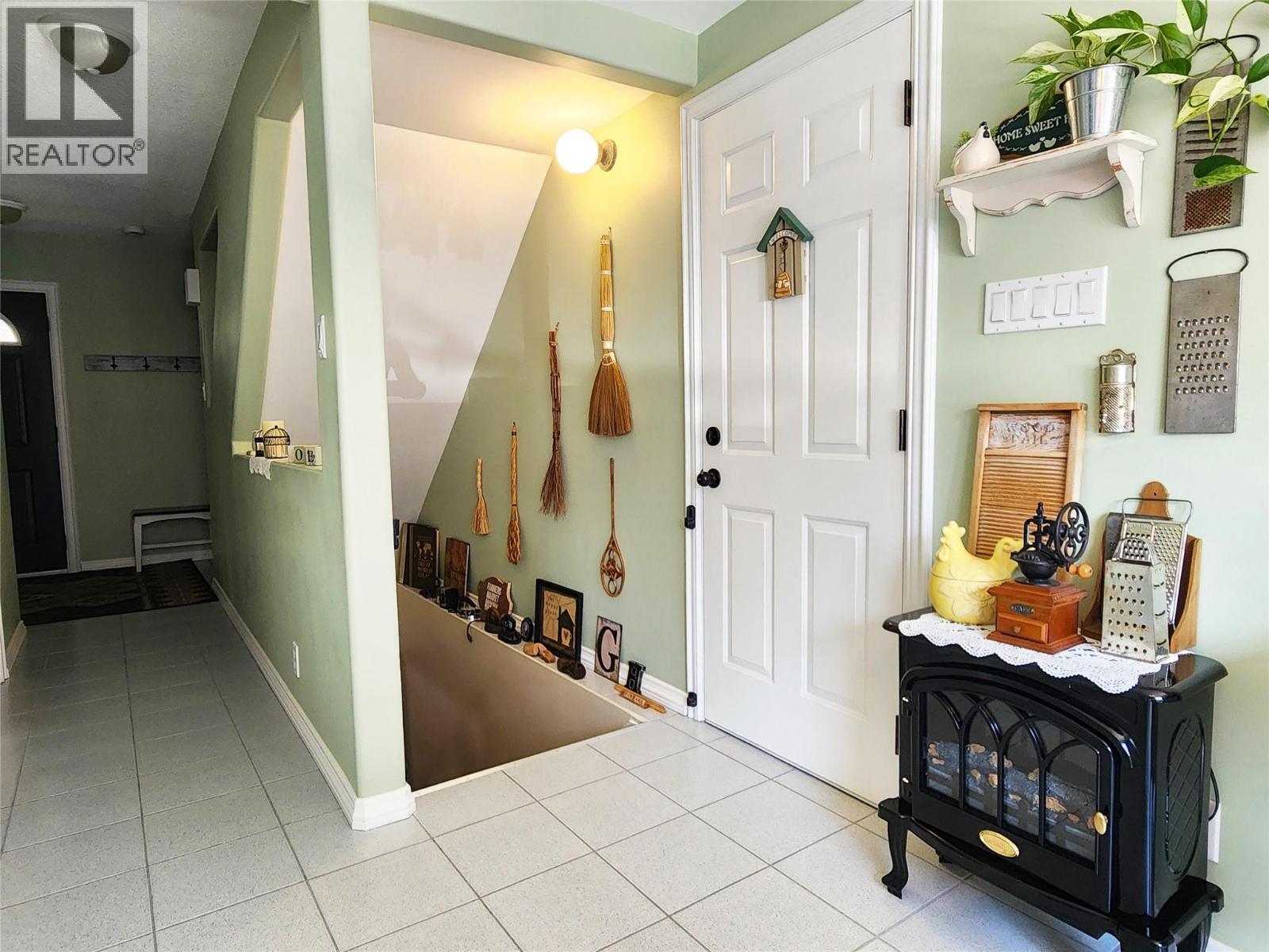 Hallway Towards Downstairs of 275 10th Avenue, Montrose BC