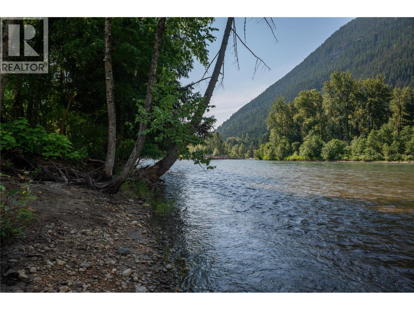 Slocan River view from the beach down the river.