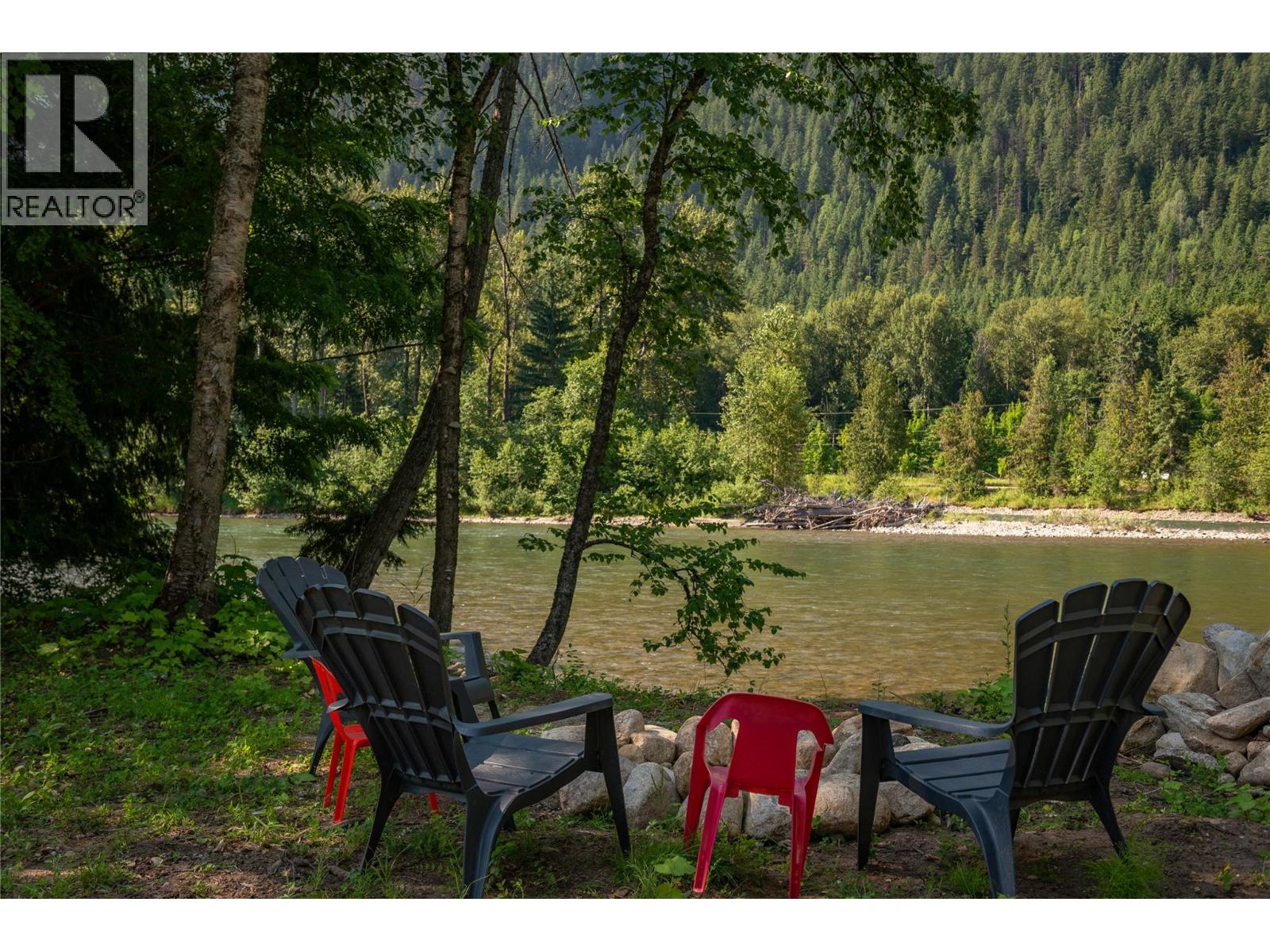 Fire pit overlooking Slocan River.