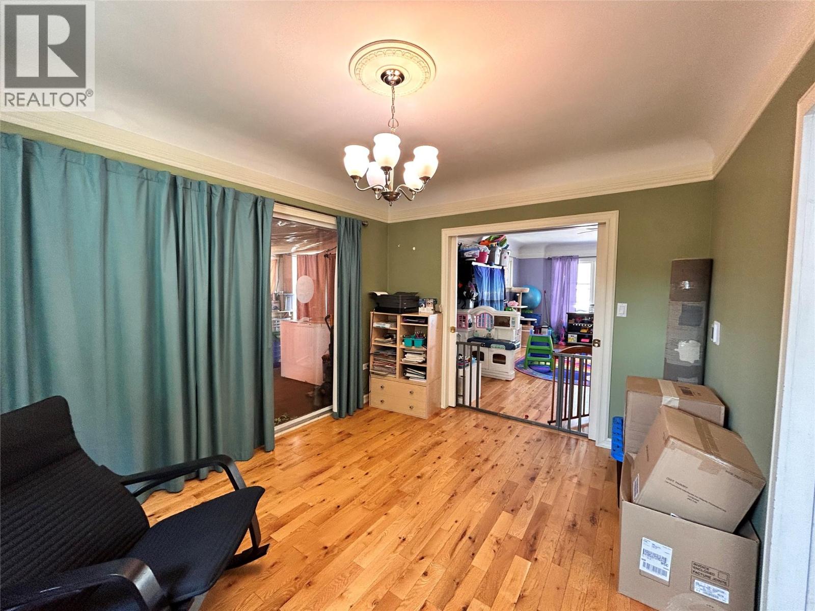 looking through dining room to living area - pocket doors between
