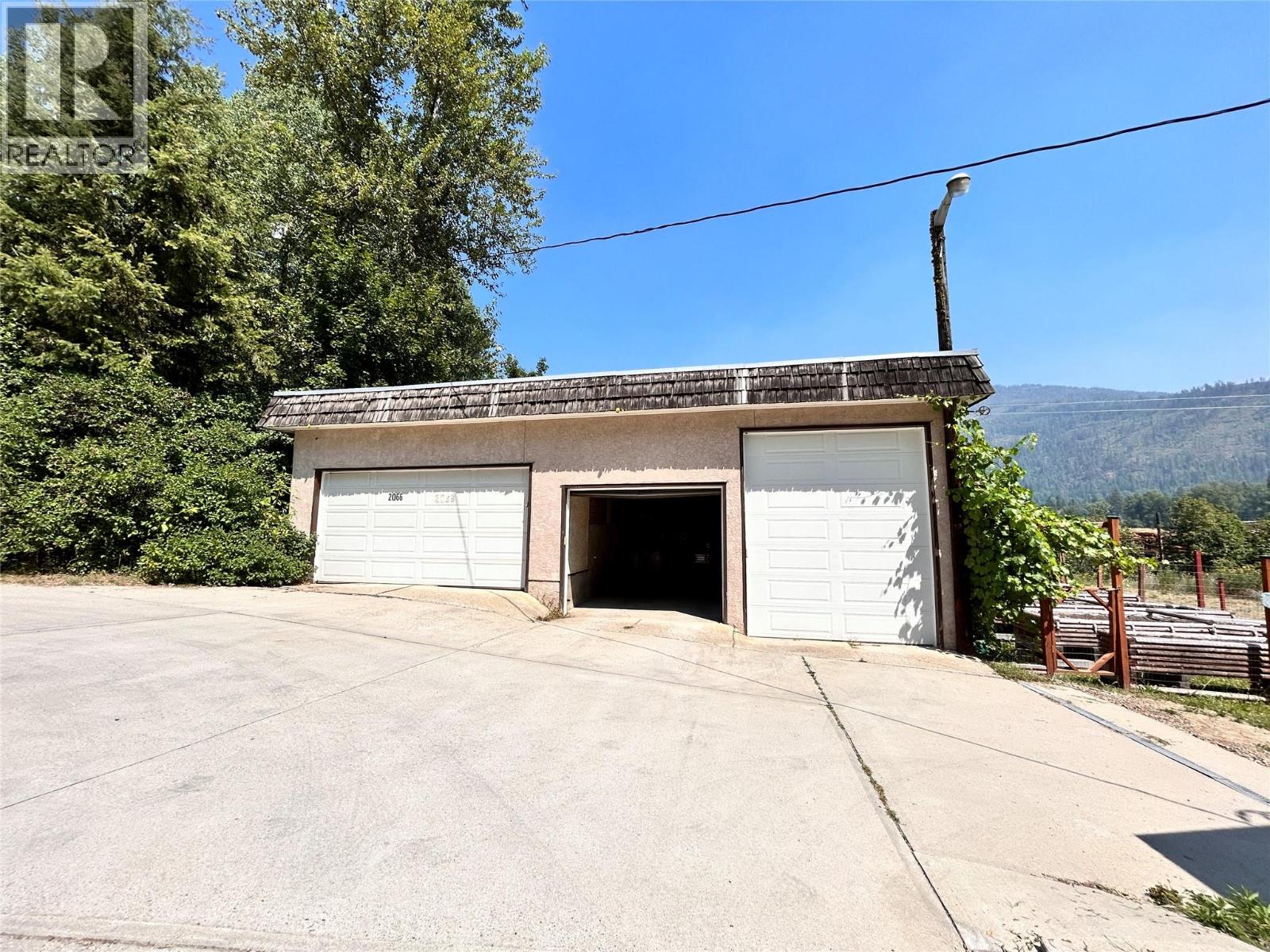 triple bay garage and parking area