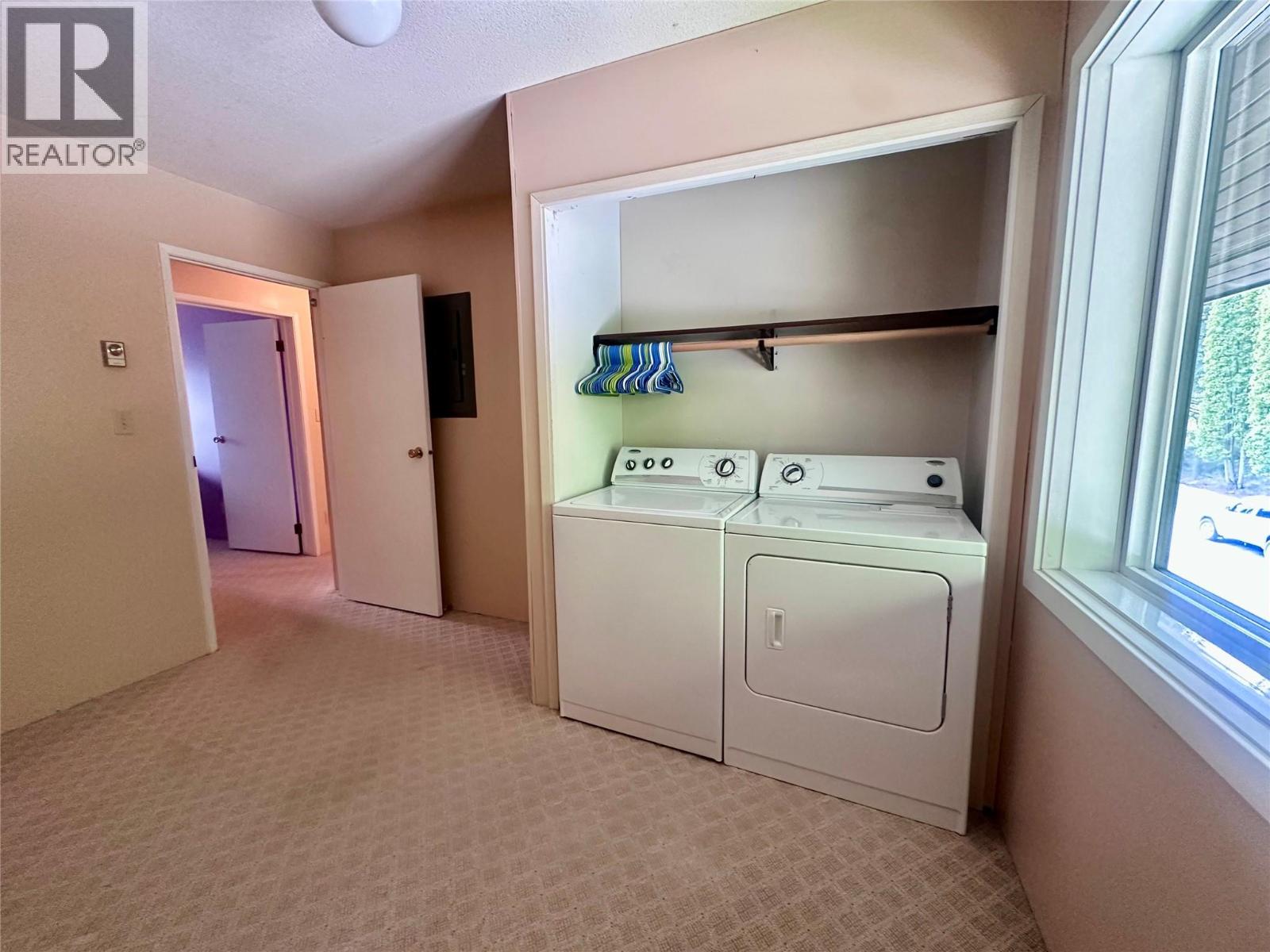 second bed with laundry