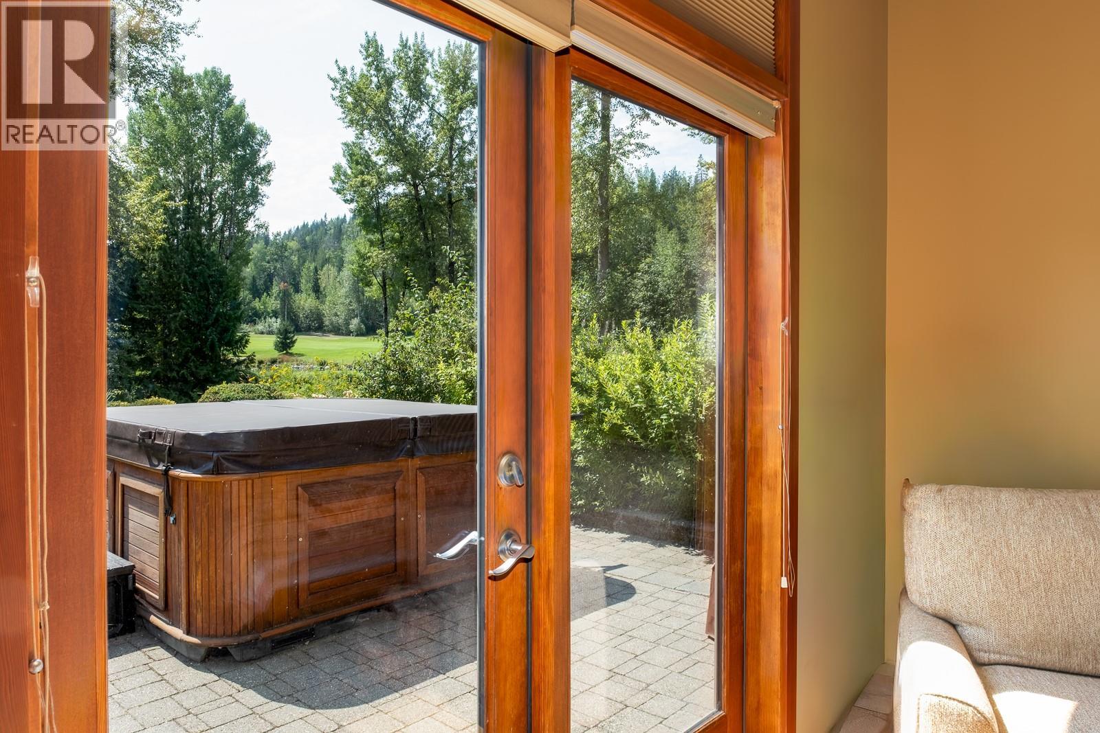 patio and hot tub outside the primary