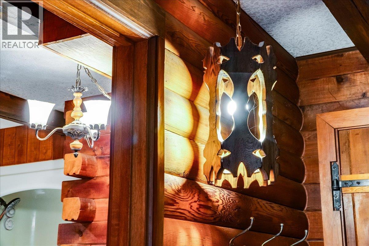 Character filled light fixture in foyer entrance.