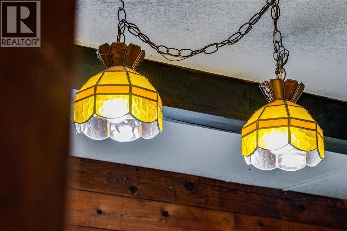 Character filled light fixture in foyer entrance.