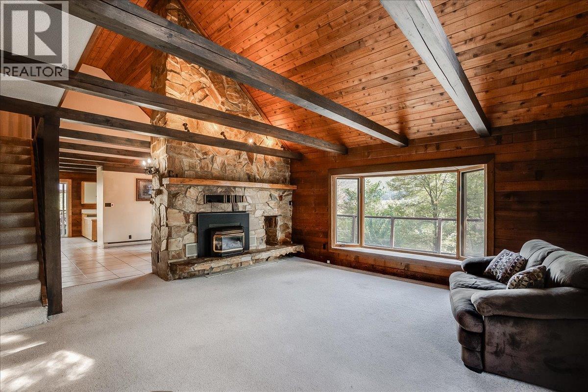 Living room with expansive bay window.