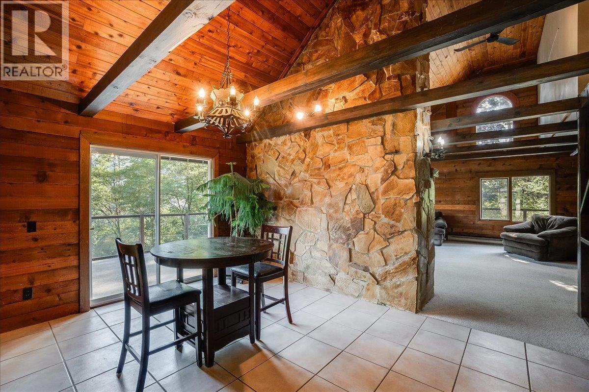 Dining room with access to wrap around deck.