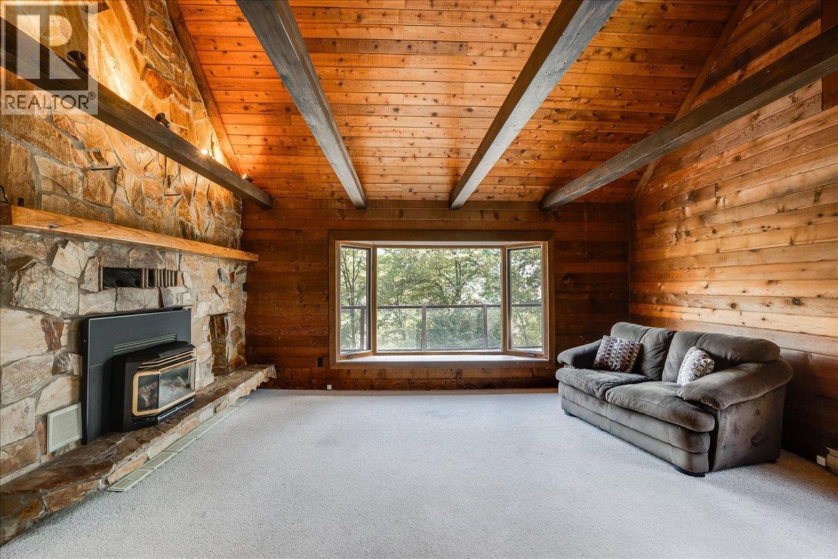 Living room with expansive bay window.