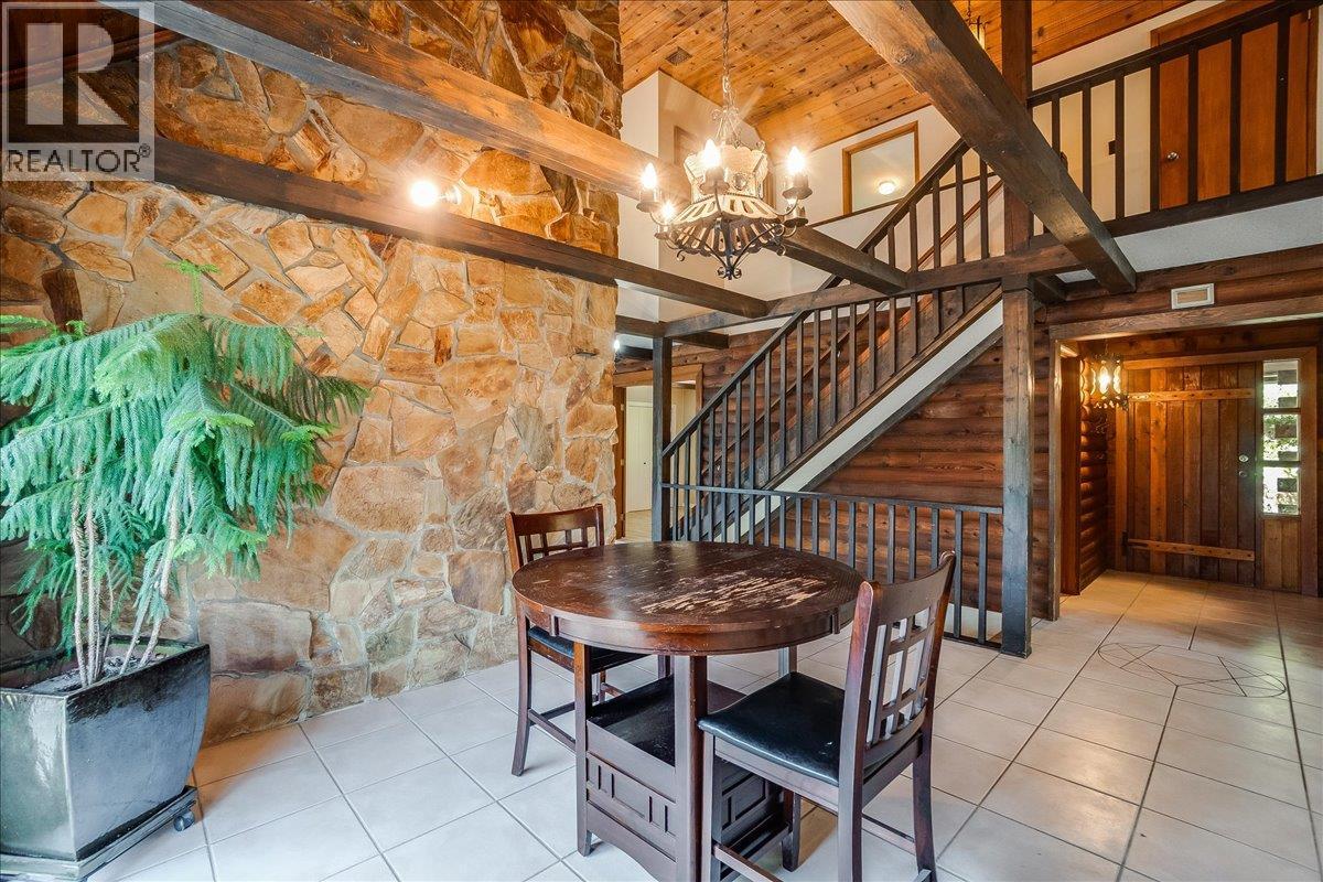 Dining room with access to wrap around deck.