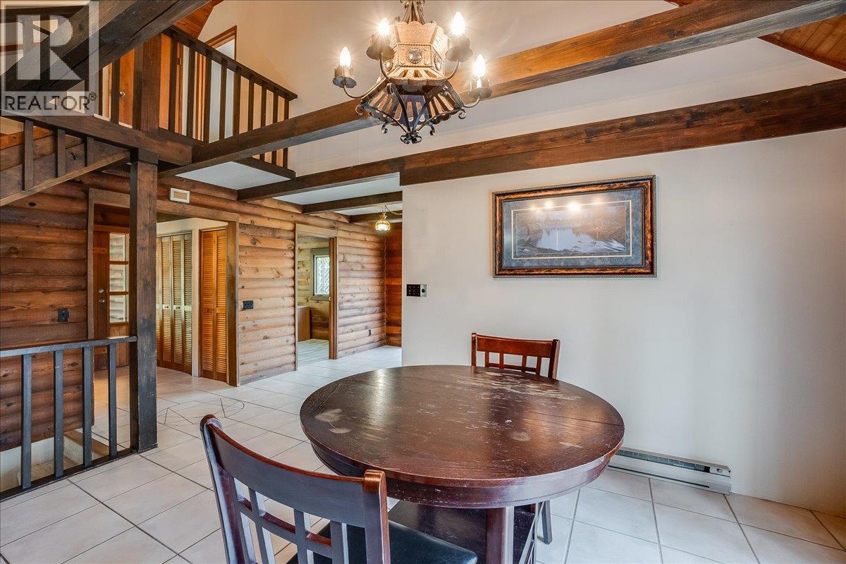 Dining room with access to wrap around deck.