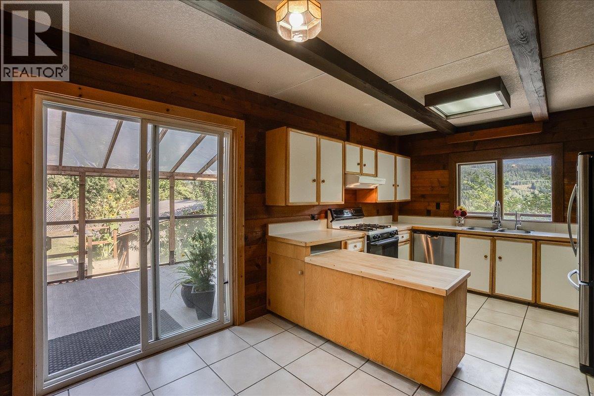 Kitchen with access to wrap around deck.