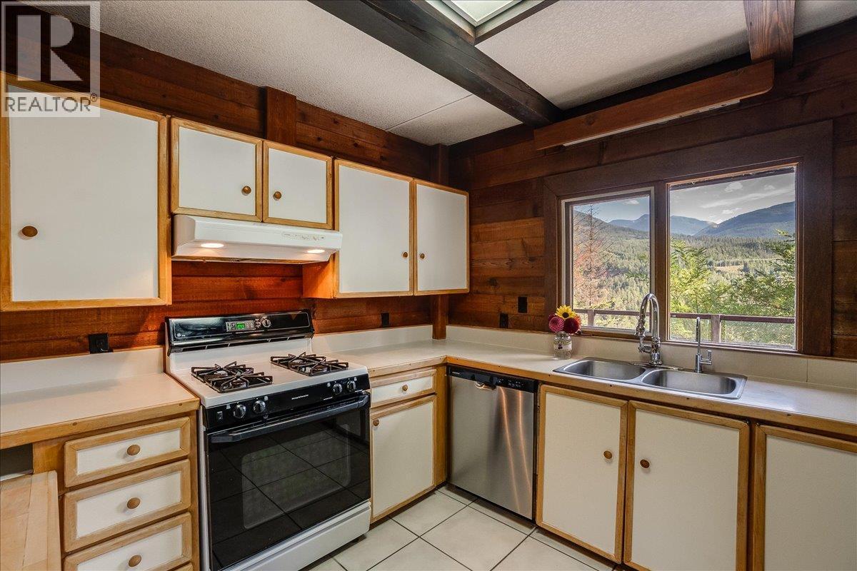 Kitchen with access to wrap around deck.