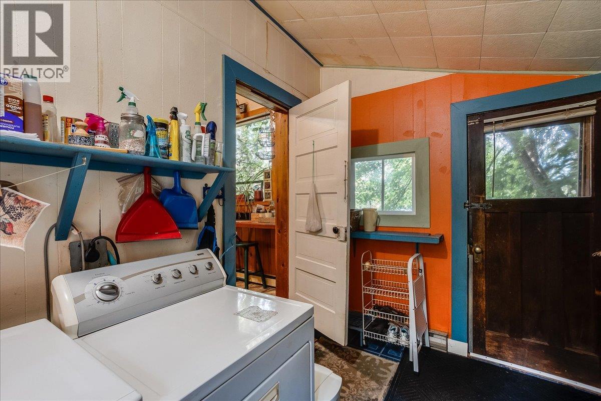 Door to backyard off laundry room