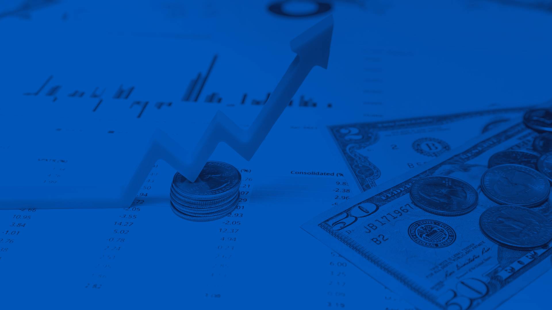 Money and Financial Documents on a Table with Yellow Upward Graph Area