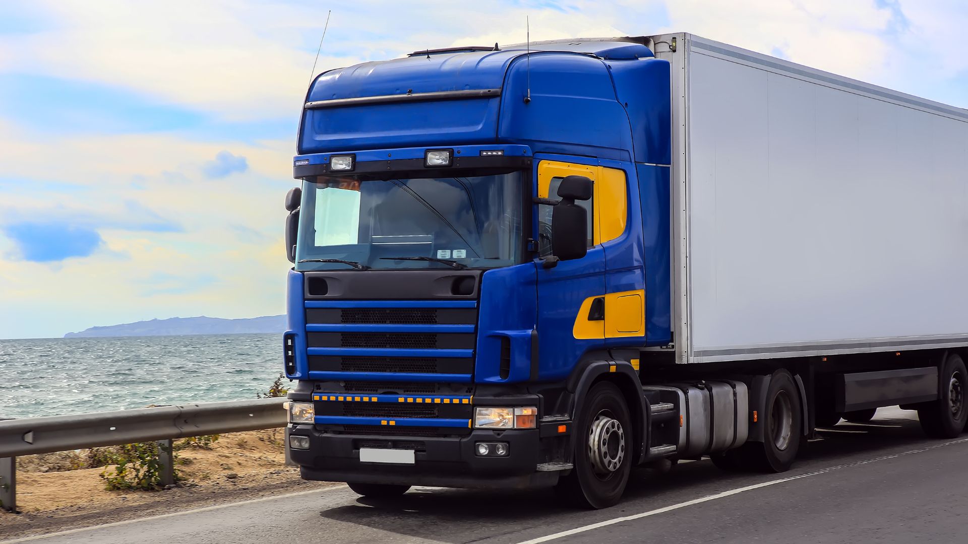 Blue Semi Truck on a Desert Highway