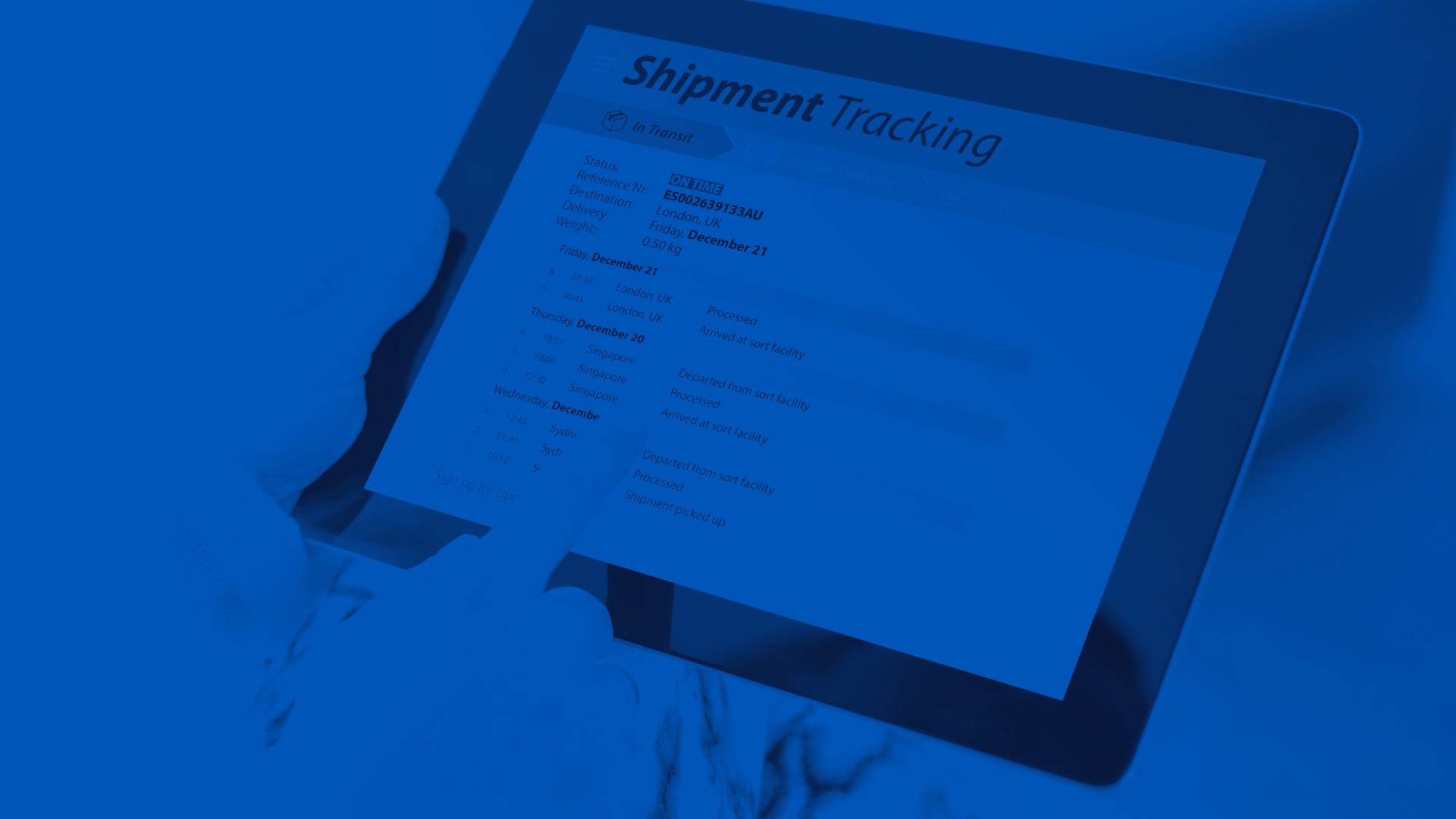 Person Looking at Shipment Tracking Information on a Tablet