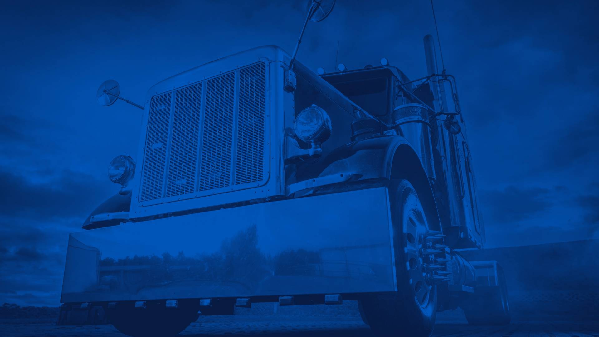 Close Up of Red Semi Truck and Bumper