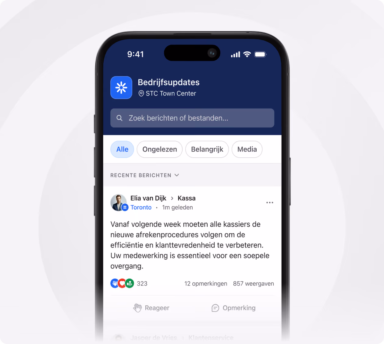 Smartphone screen showing a company updates app with a message from Elijah Cruz to cashiers in Toronto requiring new checkout procedures starting next week for efficiency and customer satisfaction, with 323 reactions, 12 comments, and 857 views.