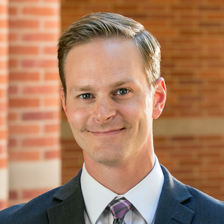 Color headshot of Tom Christensen fractional CMO