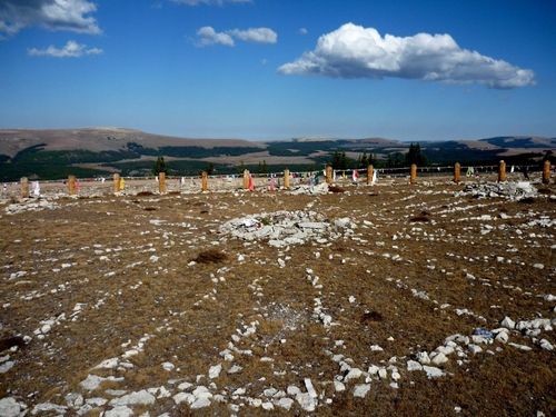 A roaring waterfall rushing down a canyon