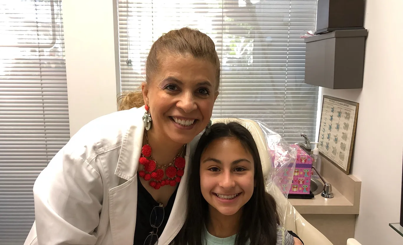 Dr. Tajaddod and young patient