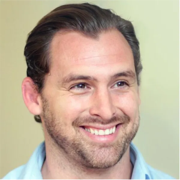 a man smiling for the camera