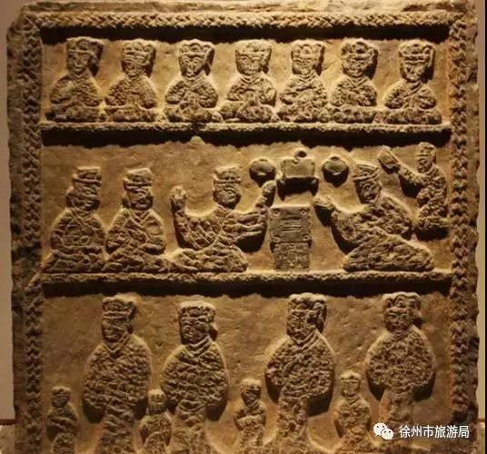 A stone carving of peopleAI-generated content may be incorrect.