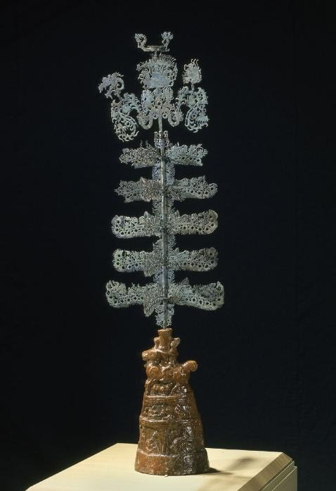 Enlarge this image. Money tree, probably 100–200. China; probably Sichuan province. Eastern Han dynasty (25–220). Bronze with glazed earthenware base. Courtesy of the Asian Art museum, Gift of the Connoisseur’s Council, 1995.79.