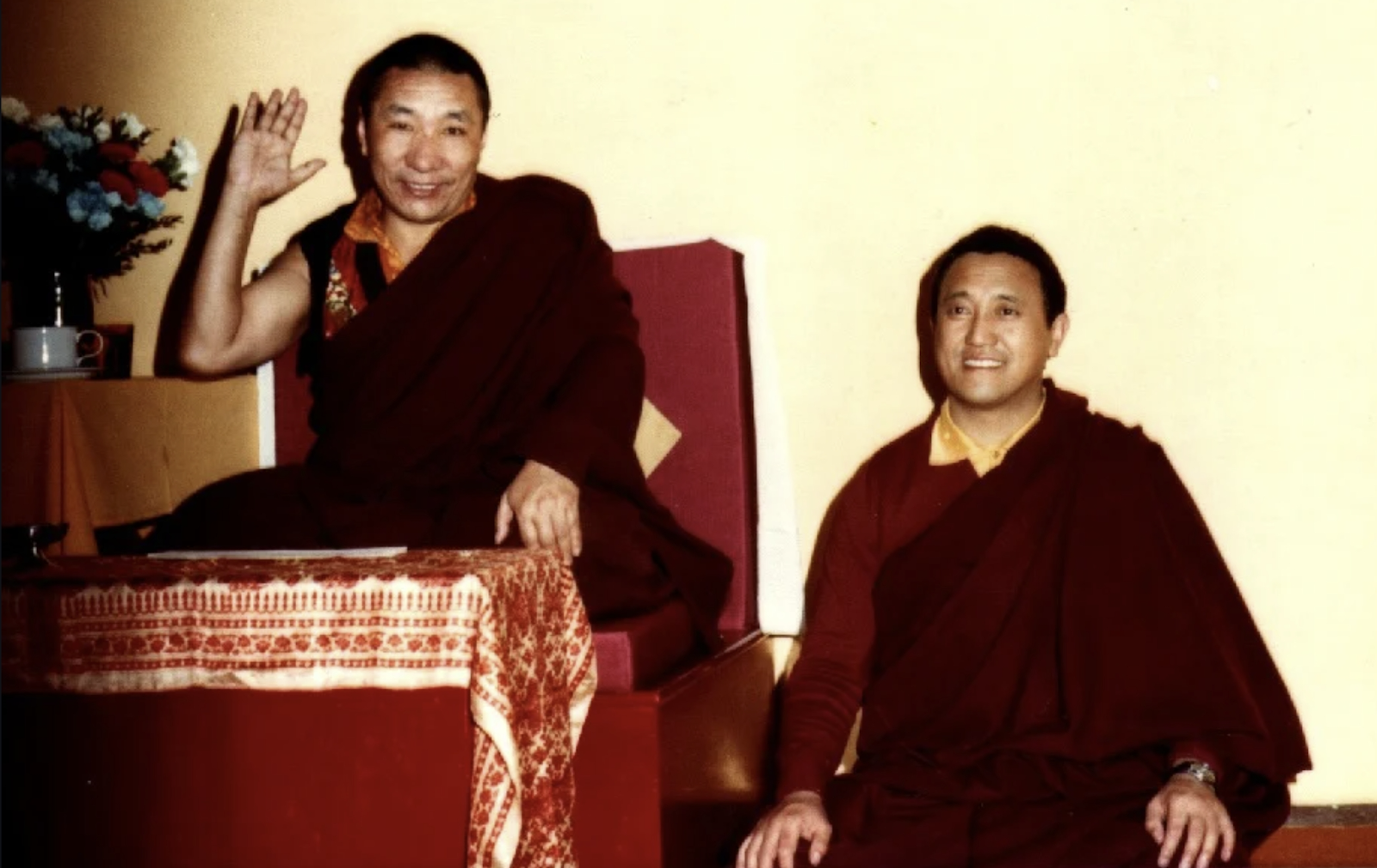 A group of men in red robesAI-generated content may be incorrect.