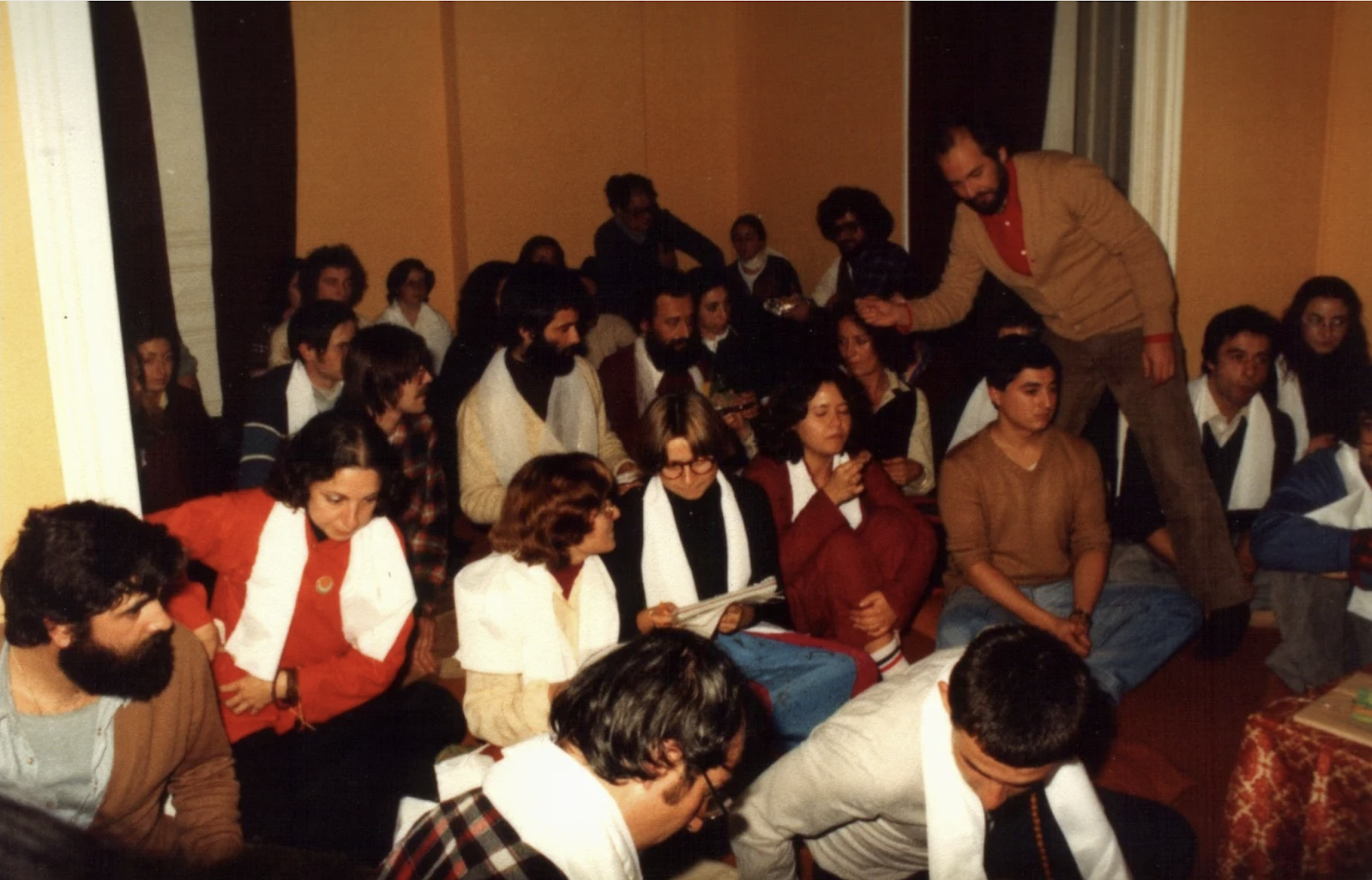 A group of people sitting in a circle