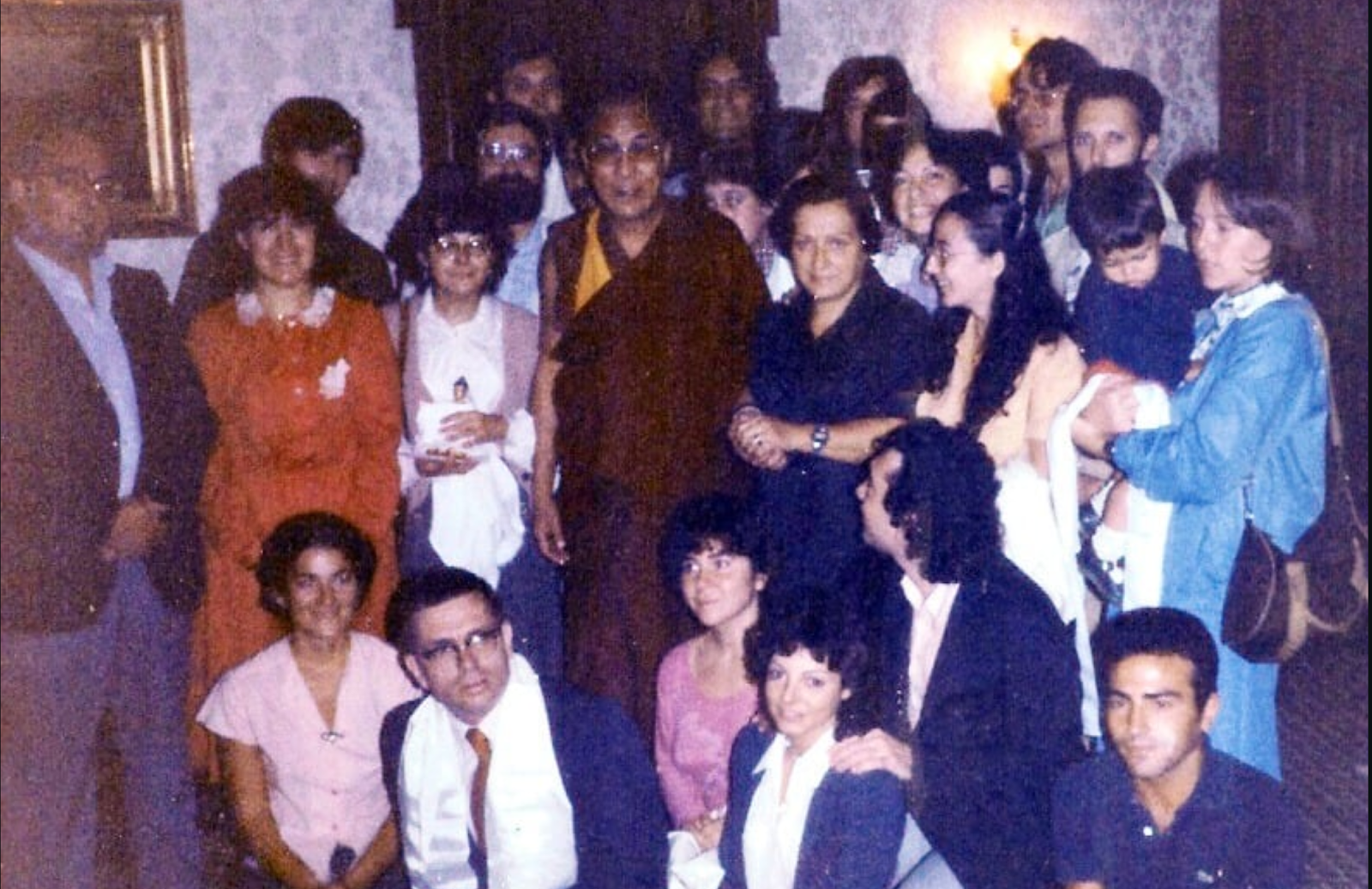 A group of people posing for a photoAI-generated content may be incorrect.