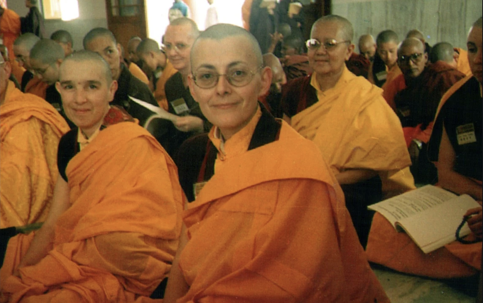 A group of people wearing robesAI-generated content may be incorrect.