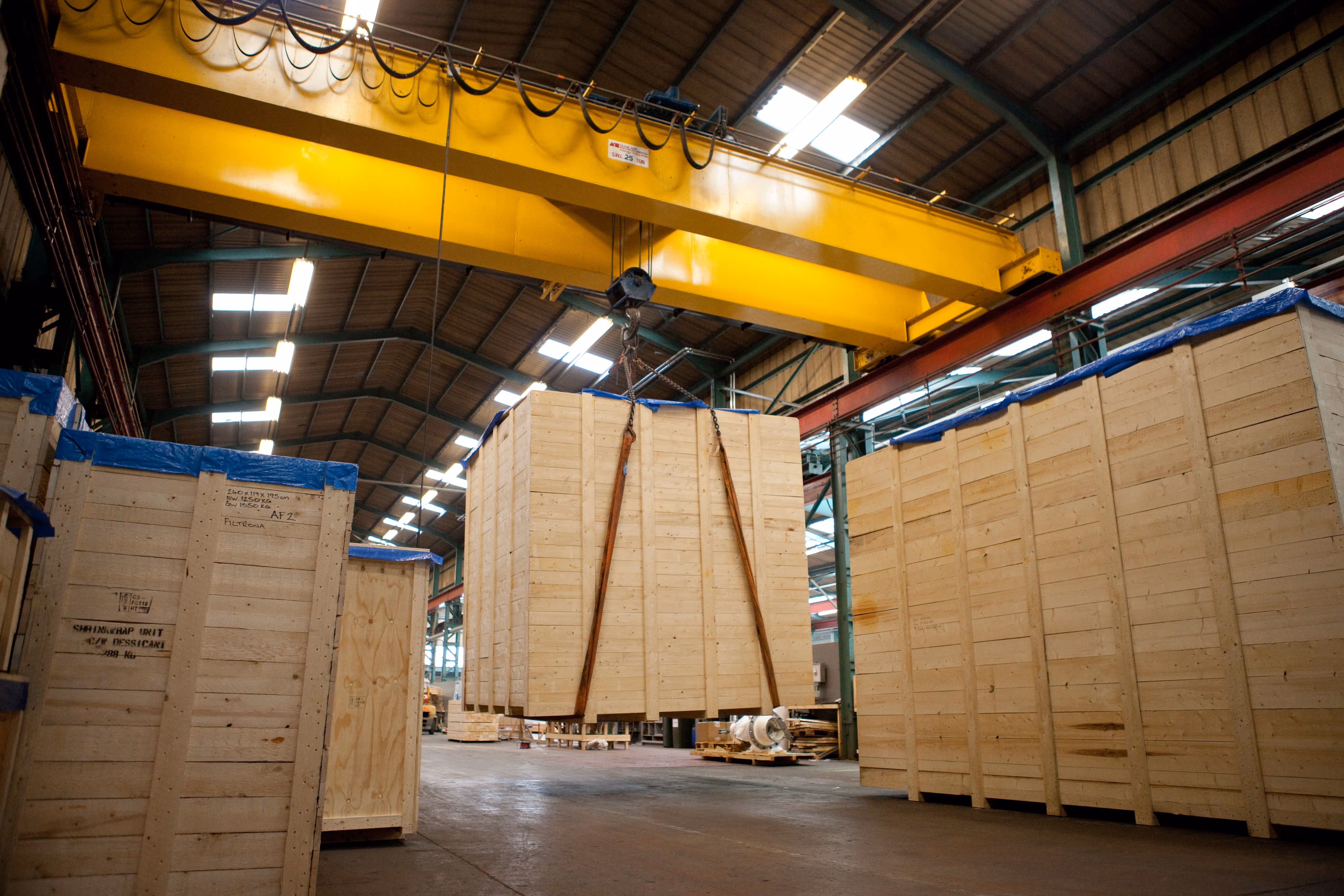a warehouse filled with lots of wooden boxes