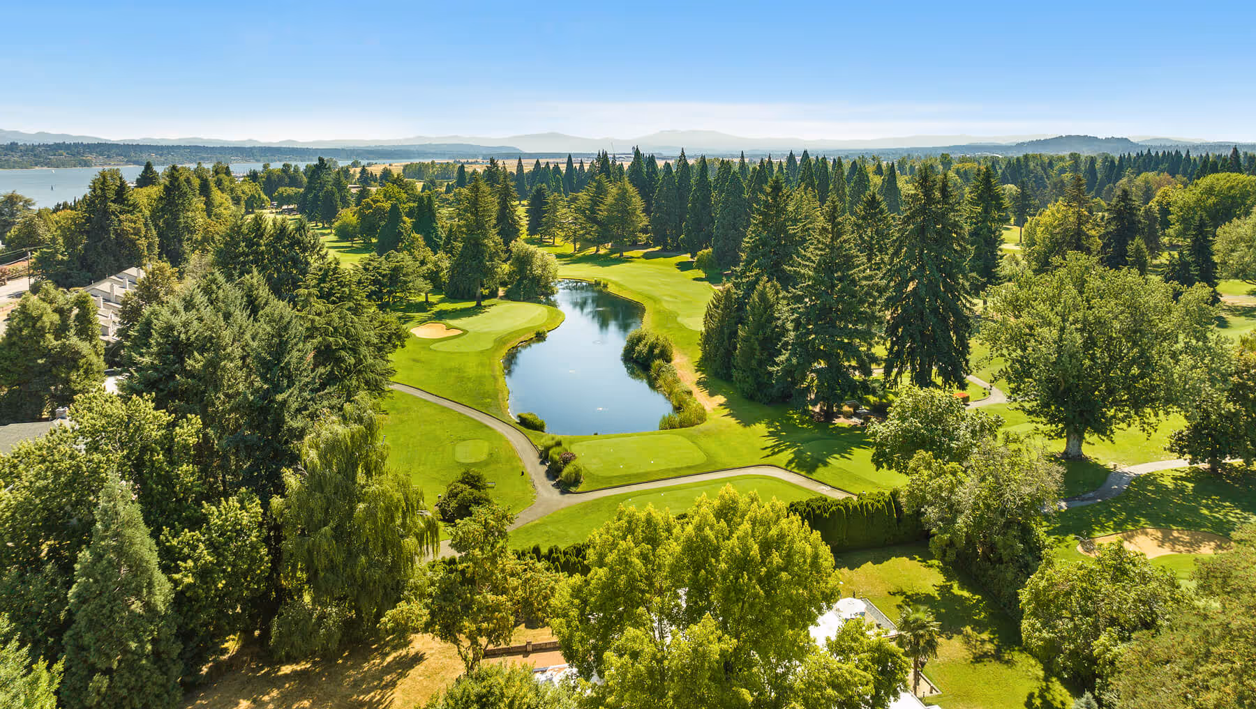 Aerial view of lush, green Macan course at Columbia Edgewater